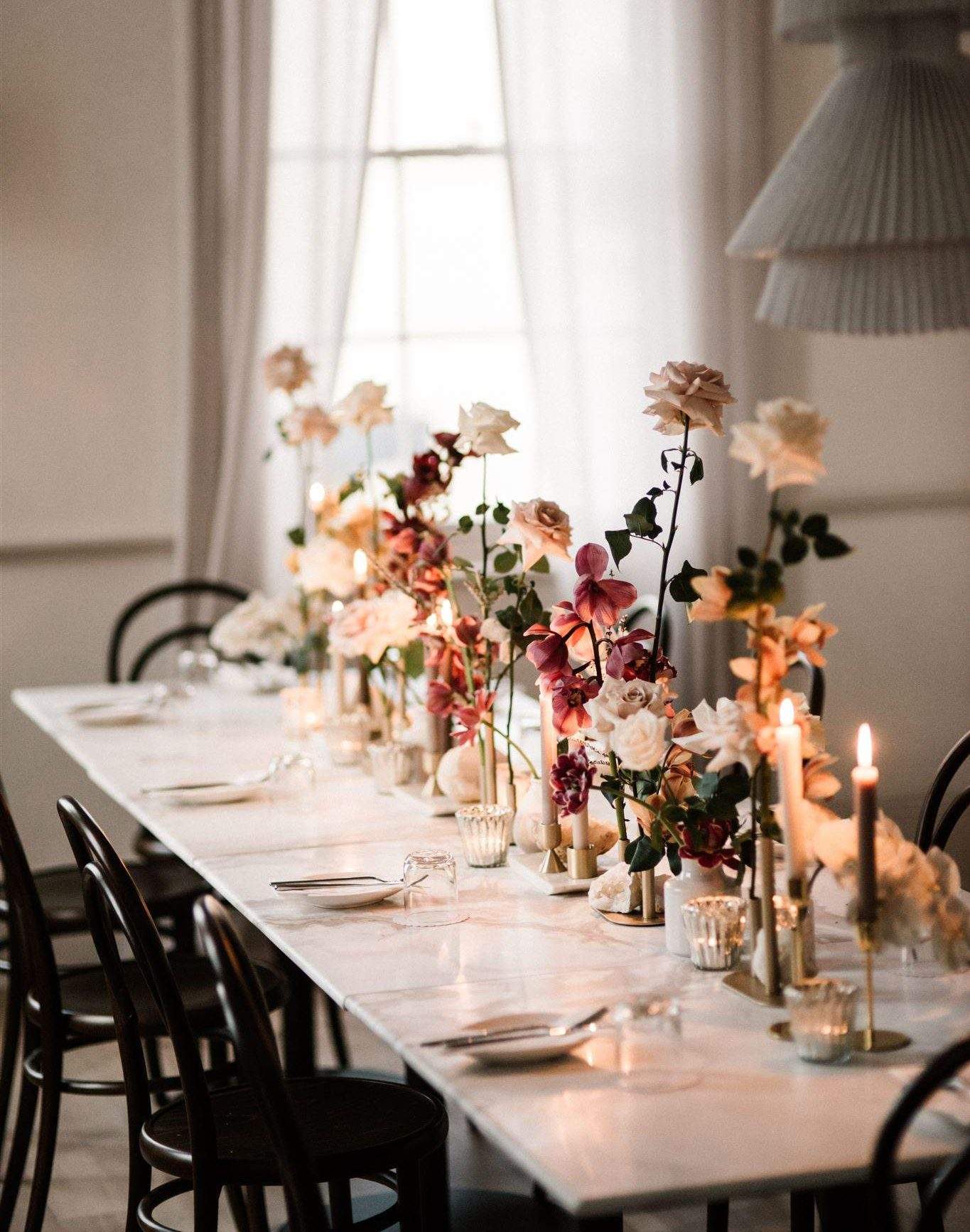 Restaurant table decorated with fresh flowers, No 92, Sydney