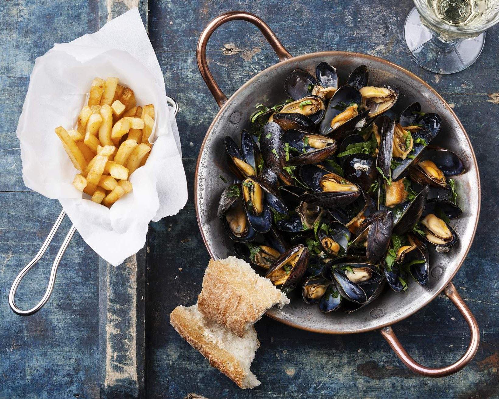 seafood dish with fries and bread