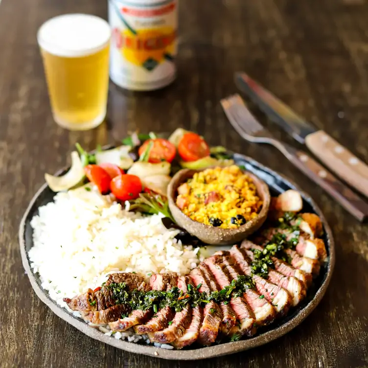 A Brazilian dish and a beer at Bossa Nova Cafe, a restaurant in Melbourne