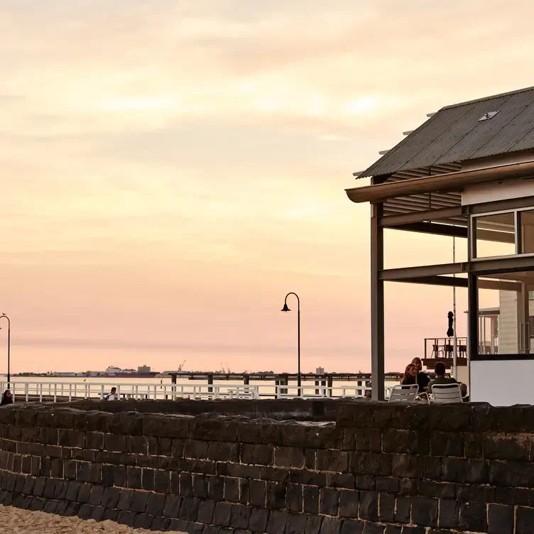 The terrace of a restaurant overlooking the beach at Pipi’s Kiosk, one of the best outdoor restaurants in Melbourne