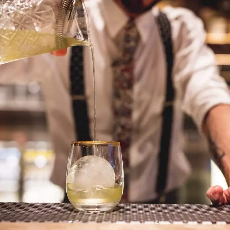 Cocktail poured by bartender at Banchō Bar, one pof the best bars in Chinatown, Sydney