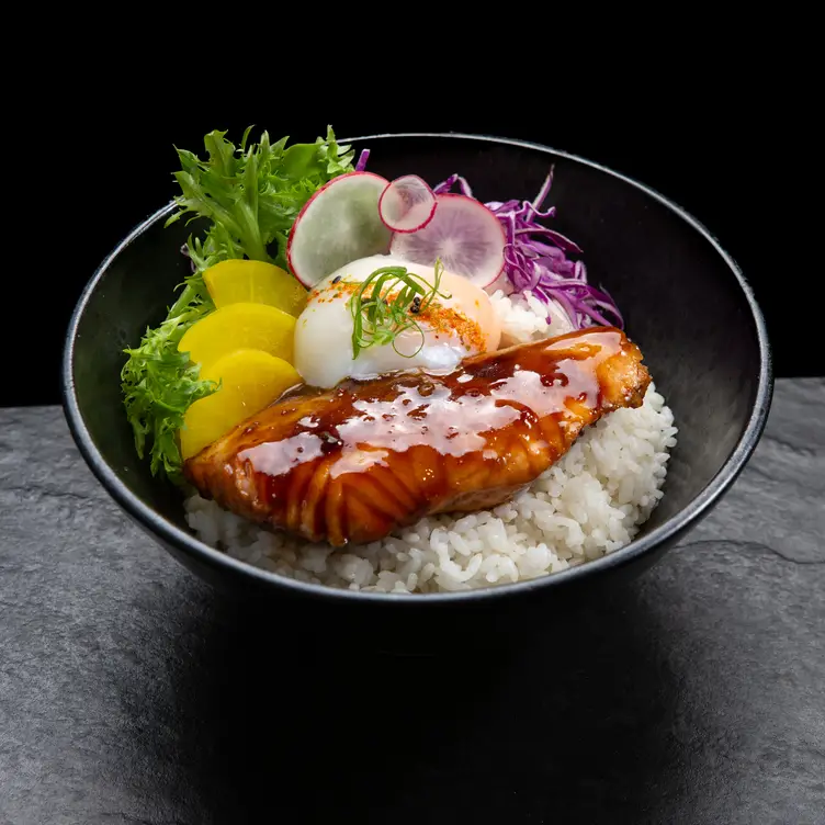 A dish with rice, salmon and egg served at Musashi Ramen, one of the best Japanese restaurants in Melbourne.