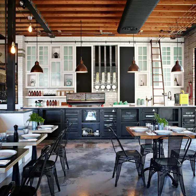 Industrial-style dining space at The Grounds of Alexandria Cafe, one of the best brunch spots in Sydney