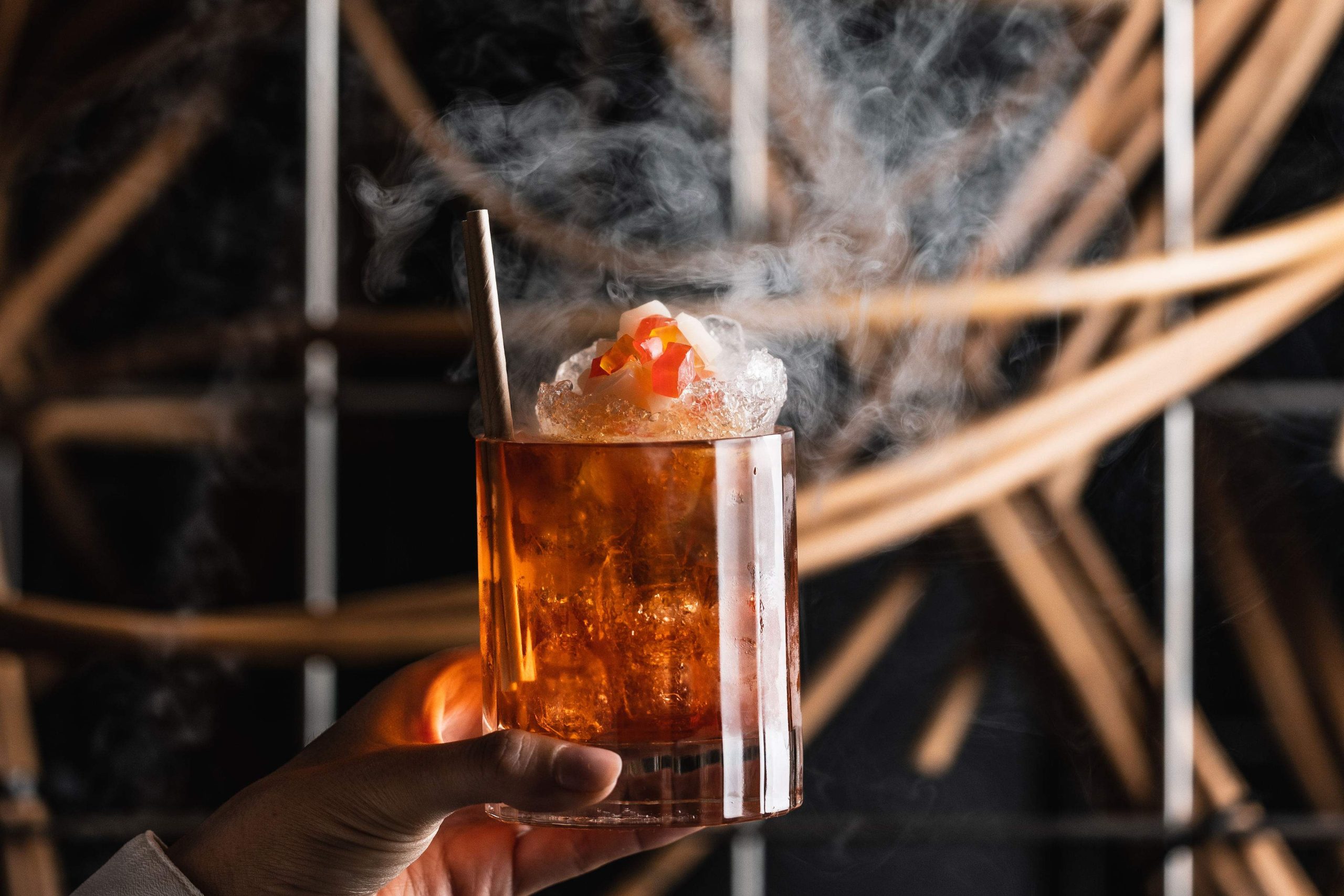 An Aperol and lychee cocktail in an orange glass at Sydney restaurant Hustlers.