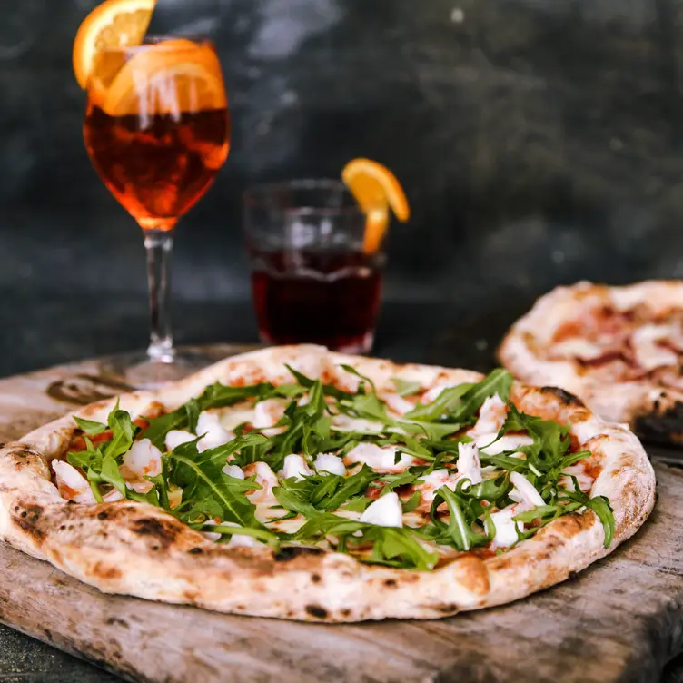 A vegan pizza topped with rocket at Verace Pizzeria, one of the best vegan restaurants in Sydney