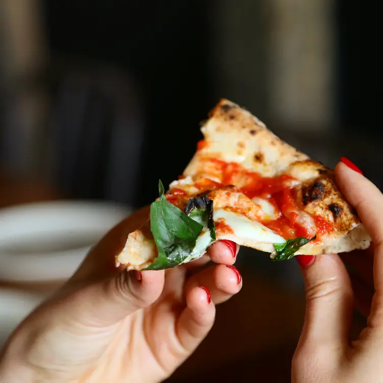 A slice of pizza at Verace Pizzeria, one of the best vegan restaurants in Sydney