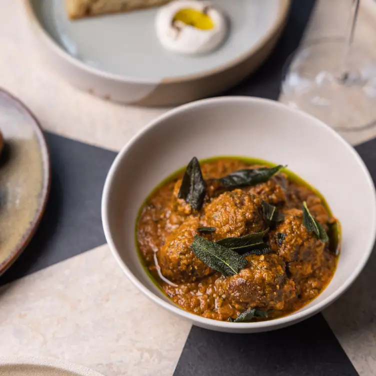 A dish of plant-based meatballs at at Alibi Bar & Dining, one of the best vegan restaurants in Sydney