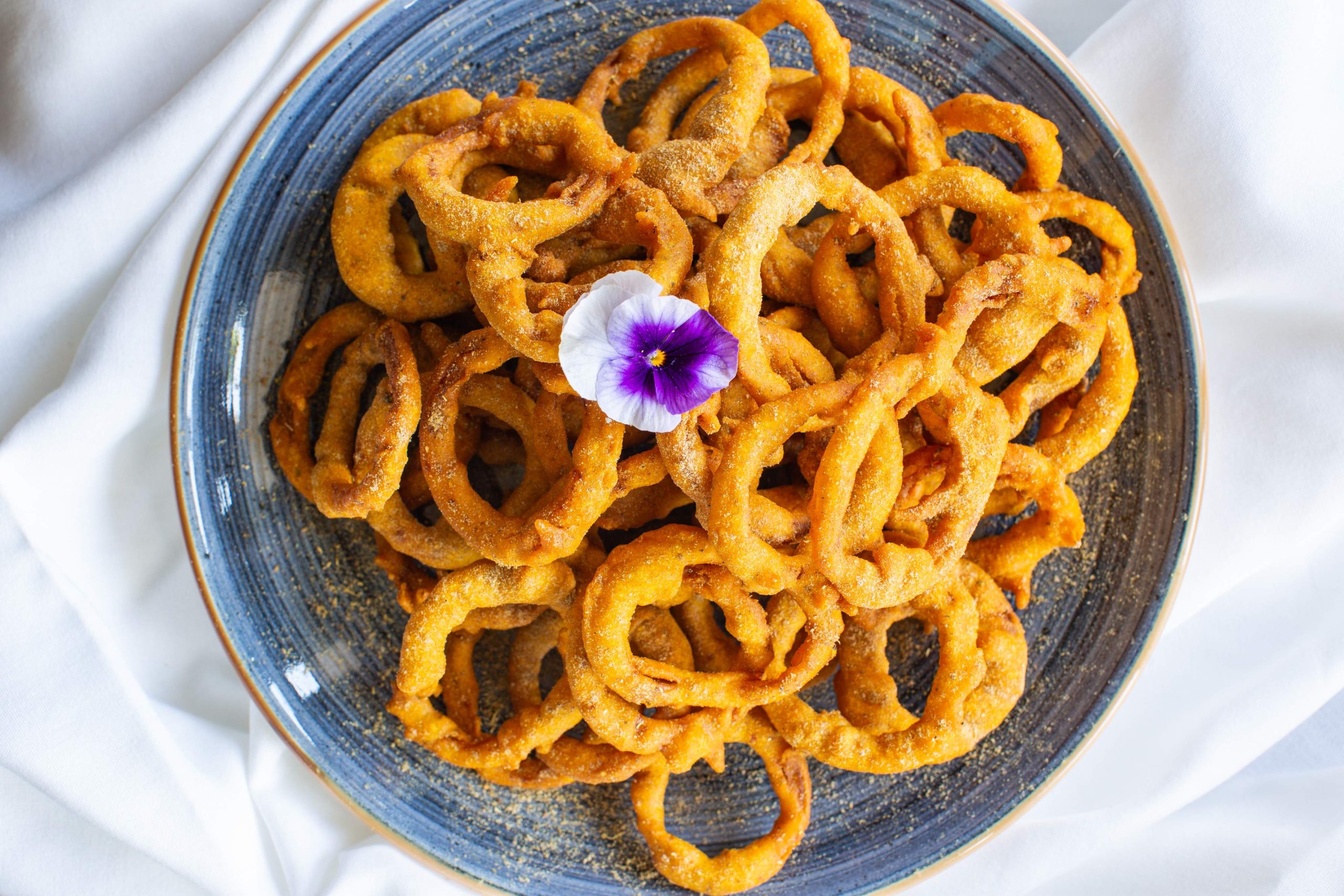 A bowl of vegan onion bahjis at Jai Ho Indian Restaurant in Melbourne