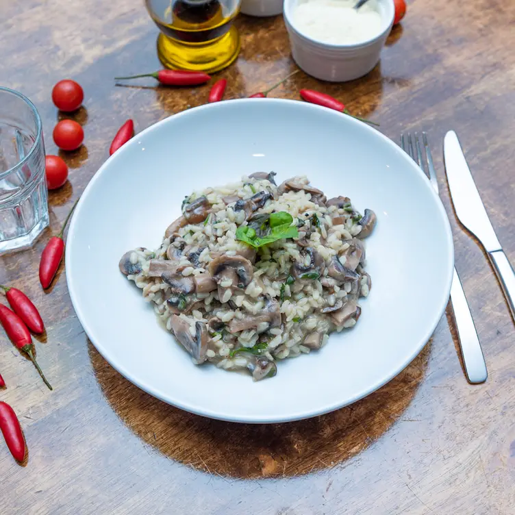 A vegan risotto with plant based chicken and mushrooms at Maccaroni Trattoria Italiana in Melbourne