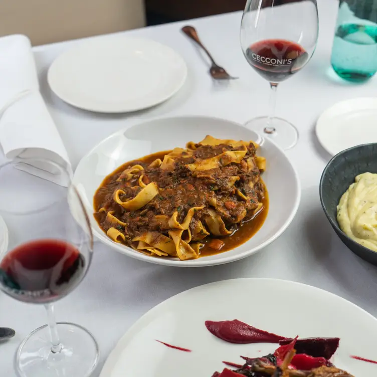 A bowl of pasta and glasses of wine at Cecconi’s Flinders Lane, one of the best Italian restaurants in Melbourne. Credit: Cecconi’s Flinders Lane