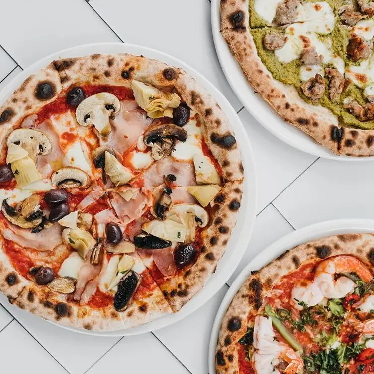 Pizzas with various toppings at DOC Pizza & Mozzarella Bar, one the best Italian restaurants in Melbourne. Credit: DOC Pizza & Mozzarella Bar