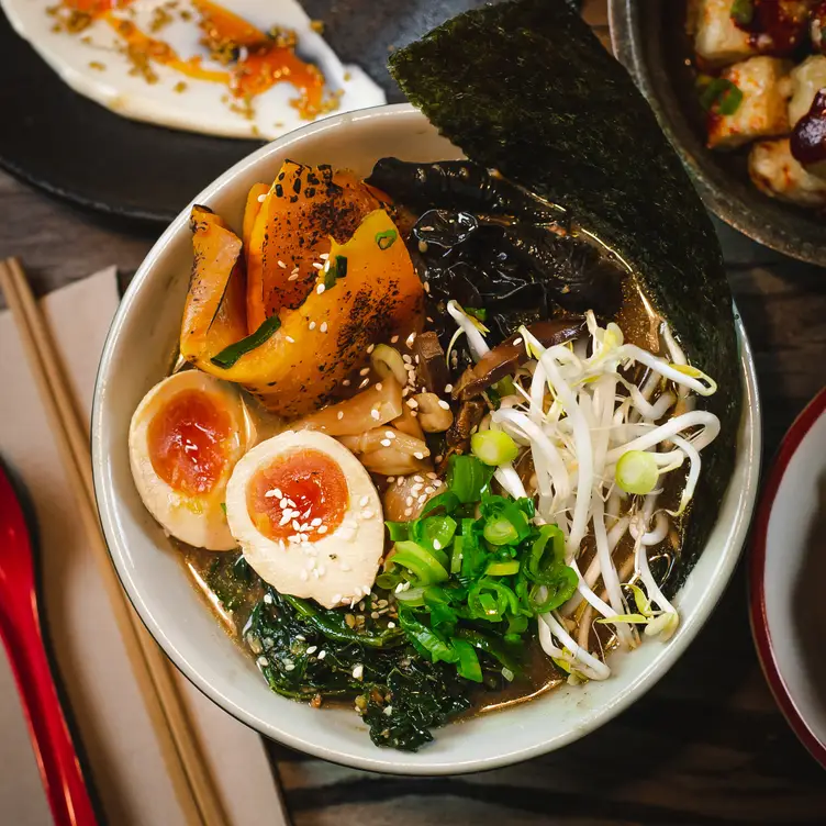 Ramen with seaweed, greens, bamboo, and marinated egg at Rising Sun Workshop in Newtown, one of the most unique restaurants in Sydney.