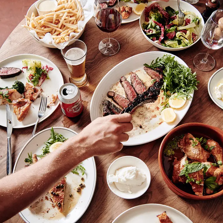 A number of dishes and sides served at Gilson, one of the best Italian restaurants in Melbourne. Credit: Gilson