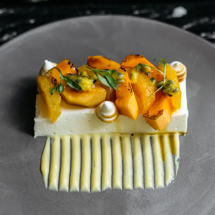 A delicate meringue with decorative elements at Glass Brasserie - Hilton Sydney, one of the best steak restaurants in Sydney. Credit: Glass Brasserie – Hilton Sydney