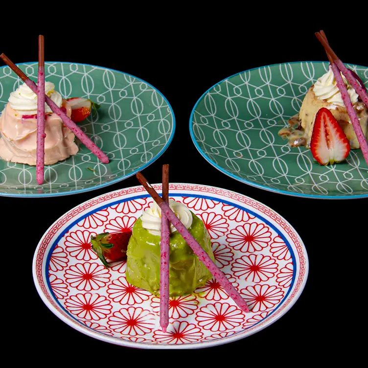 Three plates of gourmet ice cream served at Ichi Ni Nana, one of the best Asian restaurants in Melbourne.