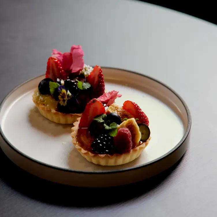 Two fruit tarts, served at Kiss and Tell, one of the best Asian restaurants in Melbourne.