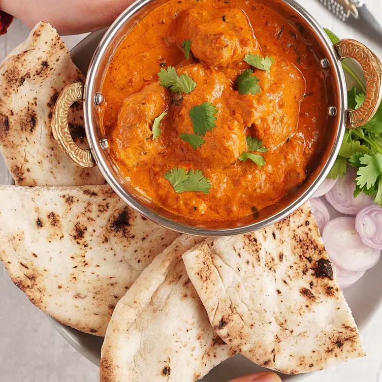 A dish with chapati on the side at Kochi Cafe, one of the best Indian restaurants in Melbourne. Credit: Kochi Cafe