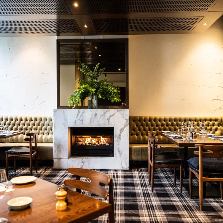 Fireplace in the dining room at Lamaro’s Hotel, one of the best steak restaurants in Melbourne. Credit: Lamaro’s Hotel