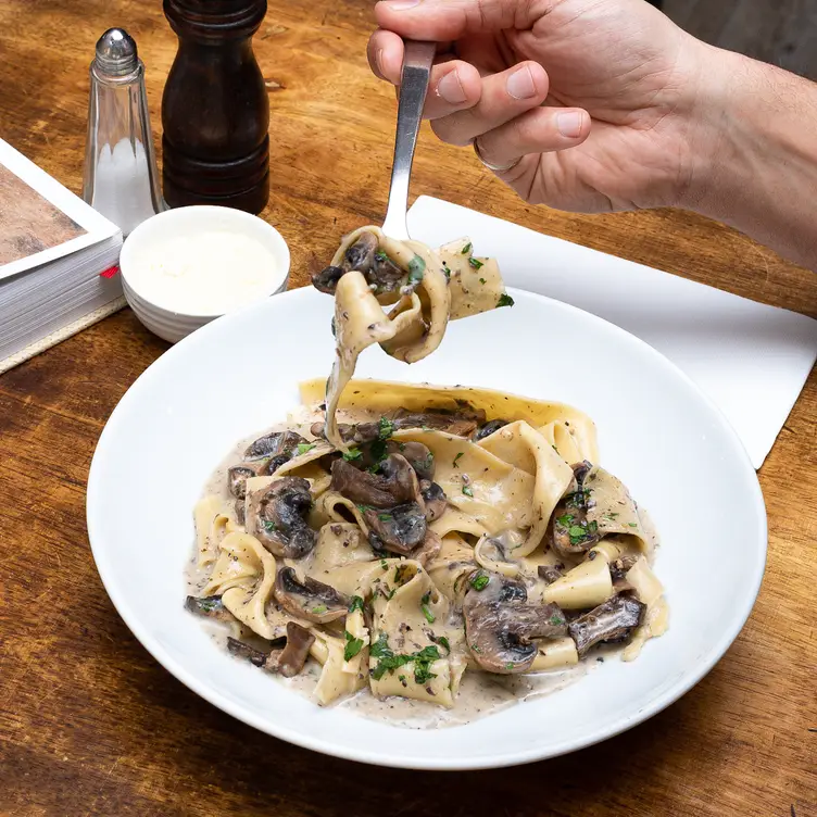 A plate of mushroom pasta at Maccaroni Trattoria Italiana – one of the best Melbourne vegetarian restaurants.