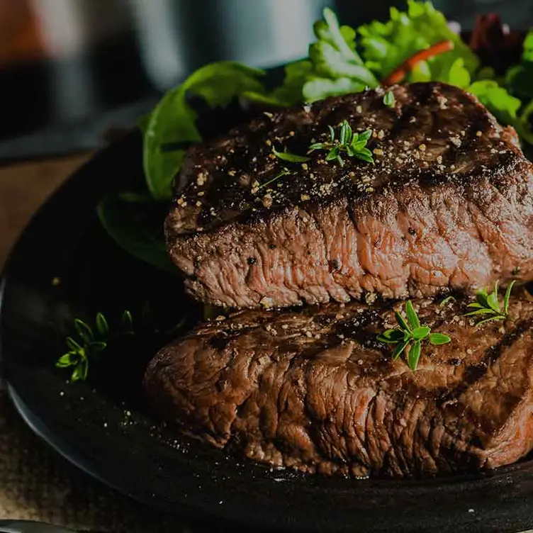 Two thick cuts of steak at Mama’s Steakhouse, one of the best steak restaurants in Sydney. Credit: Mama’s Steakhouse