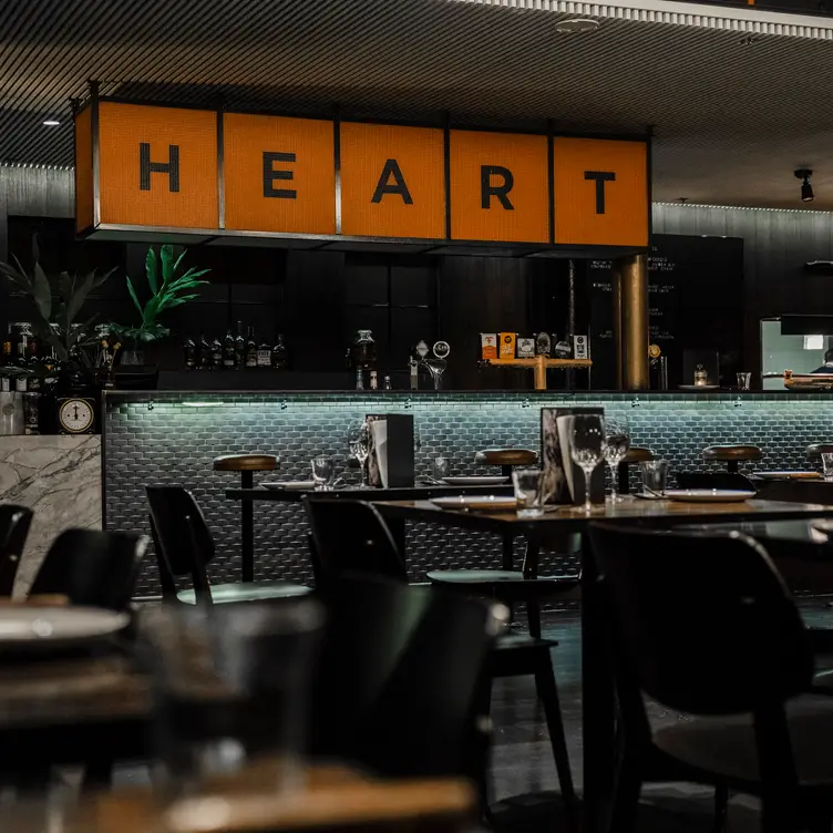 A heart sign over the bar at Meatmaiden, one of the best steak restaurants in Melbourne. Credit: Meatmaiden