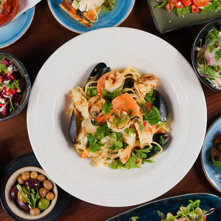 Multiple dishes on the table at Rococo, one of the best Italian restaurants in Melbourne. Credit: Rococo