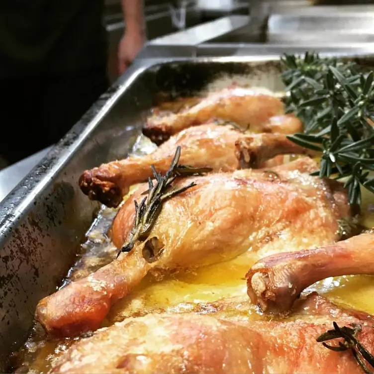 A tray of drumsticks and herbs at Treviso Bar & Dining, one of the best Italian restaurants in Melbourne. Credit: Treviso Bar & Dining