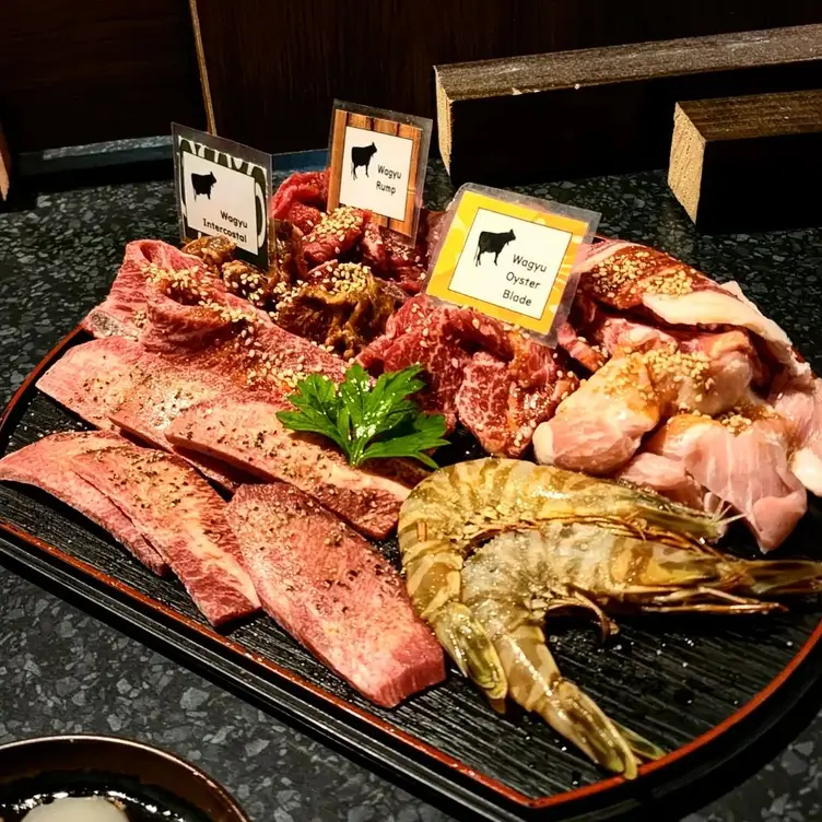 A plate of meat and seafood on display at Nonbei Sake Bar & BBQ, Fortitude Valley.