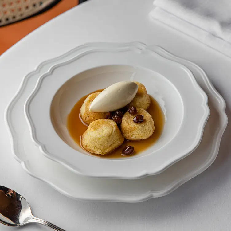 A dish of golden syrup dumplings served at Ursula's Paddington, one of the best fine dining restaurants in Sydney.