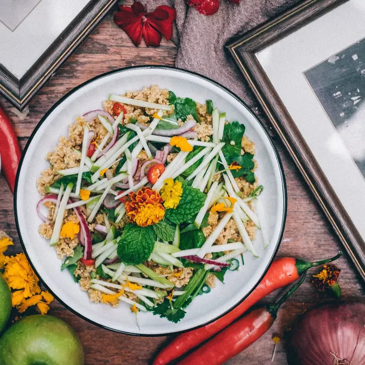 A dish garnished with flowers served at Little Turtle, one of Sydney’s best Thai restaurants.