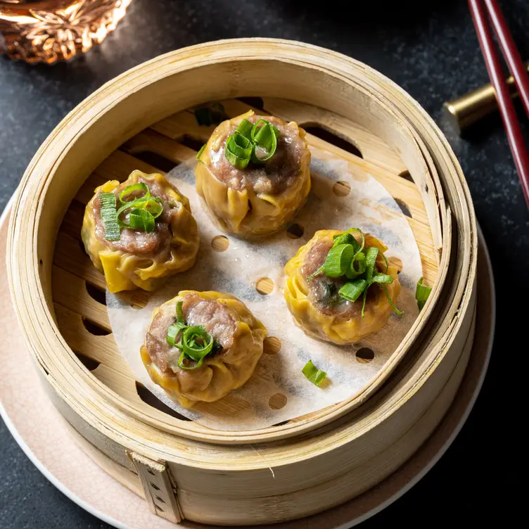 Siu mai served in a steam basket at MuMian Dining, one of Sydney’s best Chinese restaurants.