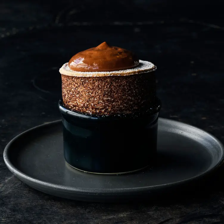 Close-up of a French dessert served at Vue de monde, one of the best French restaurants in Melbourne’s CBD.