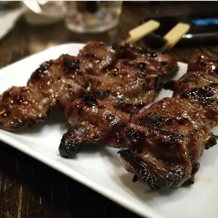 A plate of grilled skewers served at Tokyo Bird, one of the best restaurants in Sydney for trying yakitori.