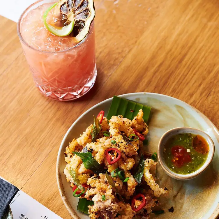 A dish and cocktail served at Rin Sura, one of Melbourne’s best Thai restaurants.