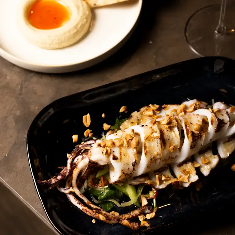 A dish topped with nuts served at Four Sides Bar and Kitchen, one of the most romantic restaurants in Adelaide.