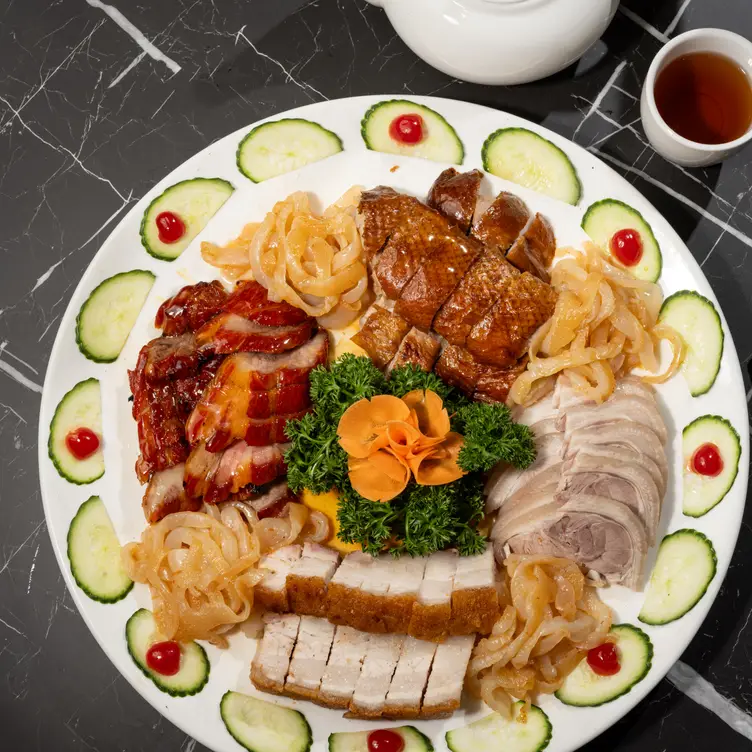 A plate of meat served at Royal Palace Seafood Restaurant in Sydney.