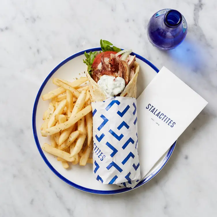 A giro and chips served at Stalactites Restaurant in the Melbourne CBD.