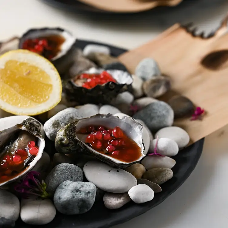 An oyster dish served at Vintaged Bar and Grill, one of the best seafood restaurants in Brisbane.