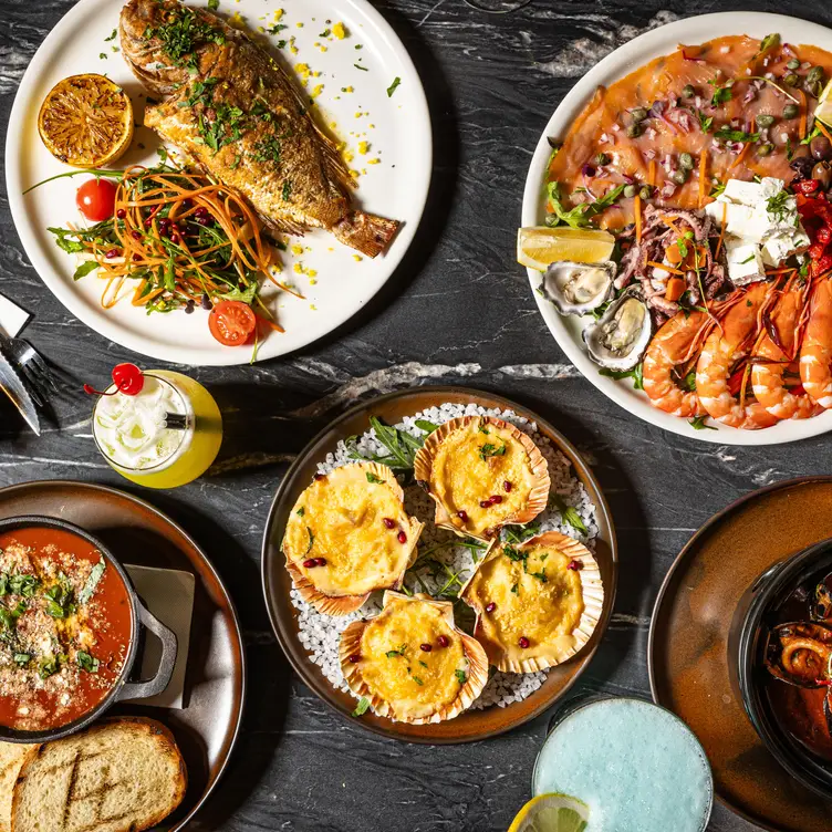 An array of seafood dishes served at Neyvine Seafood & Grill, one of Sydney’s best seafood restaurants.