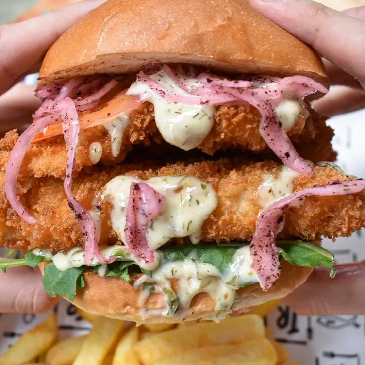 A burger served at Tommy Ruff Fishbar, one of the best seafood restaurants in Melbourne.