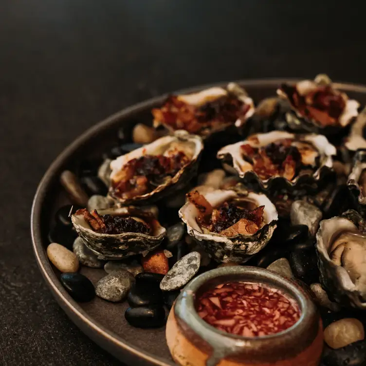 Woodfired mussels served at Sir Paz Estate, one of the best winery restaurants in Victoria.