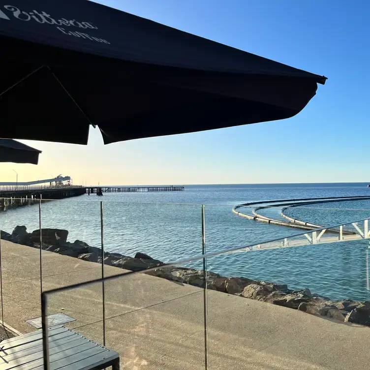 The view from an outdoor table at The Shores Eatery shows how close the water is to the restaurant.