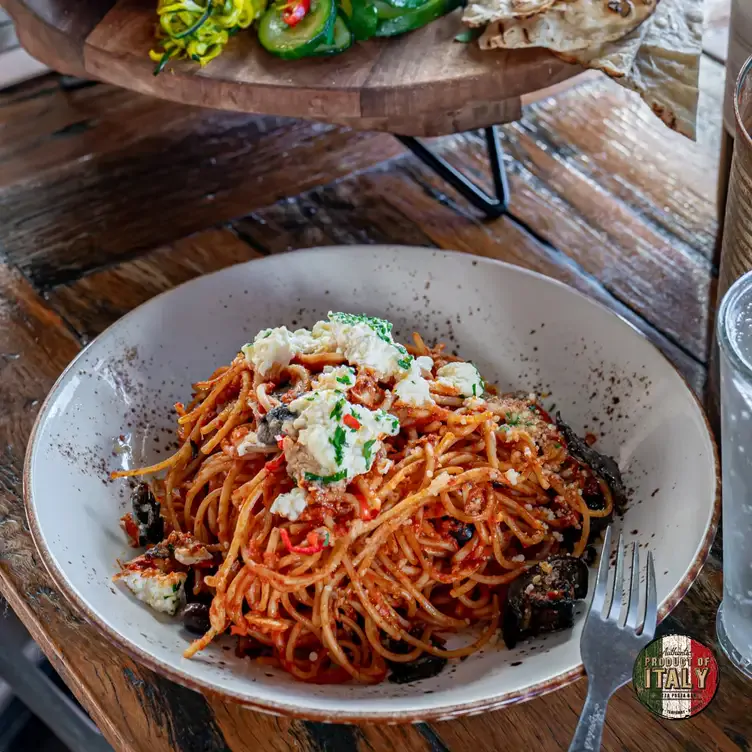 A tomato-based pasta topped with cheese served at Product of Italy Kellyville, one of Sydney’s best new restaurants.