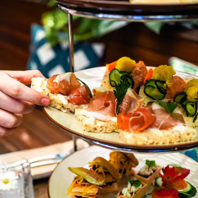 A tiered dish with small savoury bites served at Covent Garden, one of the best brunch places in Brisbane.