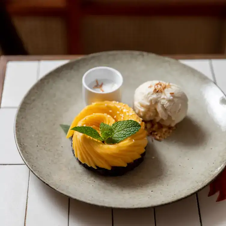 A mango and ice cream dessert served at Jumbo Thai Restaurant & Bar, one of the best family restaurants in Brisbane.