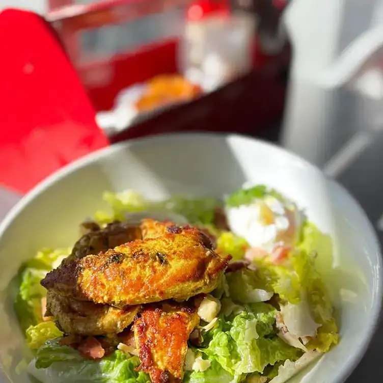 A chicken salad at Pancake Diner Coolangatta, one of the best brunch spots on the Gold Coast.