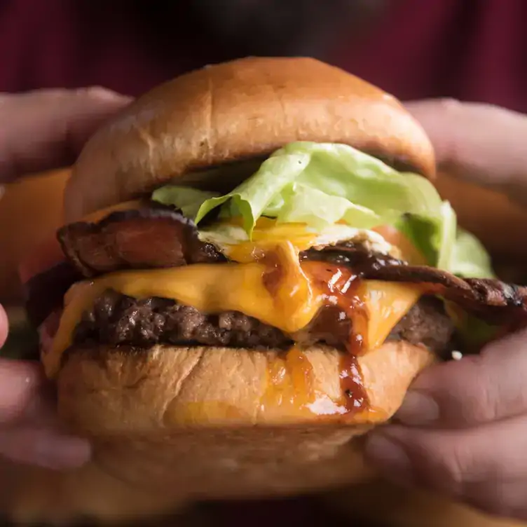 Juicy burgers help round out the menu at Outback Steakhouse. Credit: Outback Steakhouse