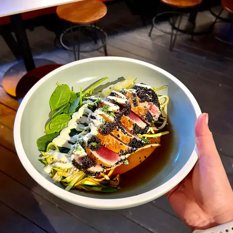 A seafood dish topped with seeds served at Sandgate Post Office Hotel, one of Brisbane’s best pubs.