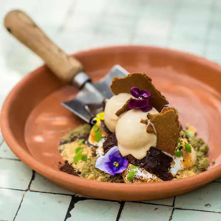 A desserts with ice cream and crumbles at The Potting Shed in Sydney